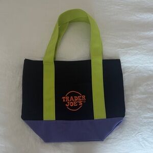 Trader Joe's Black and Purple Tote Bag with Green Handles